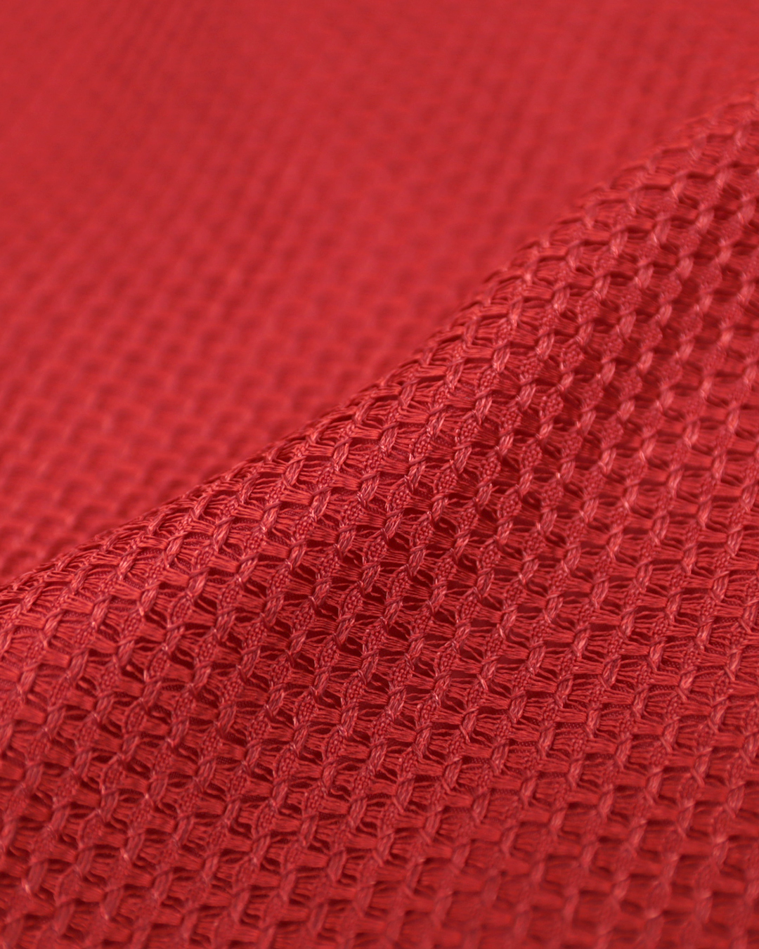 レッドの生地の織り